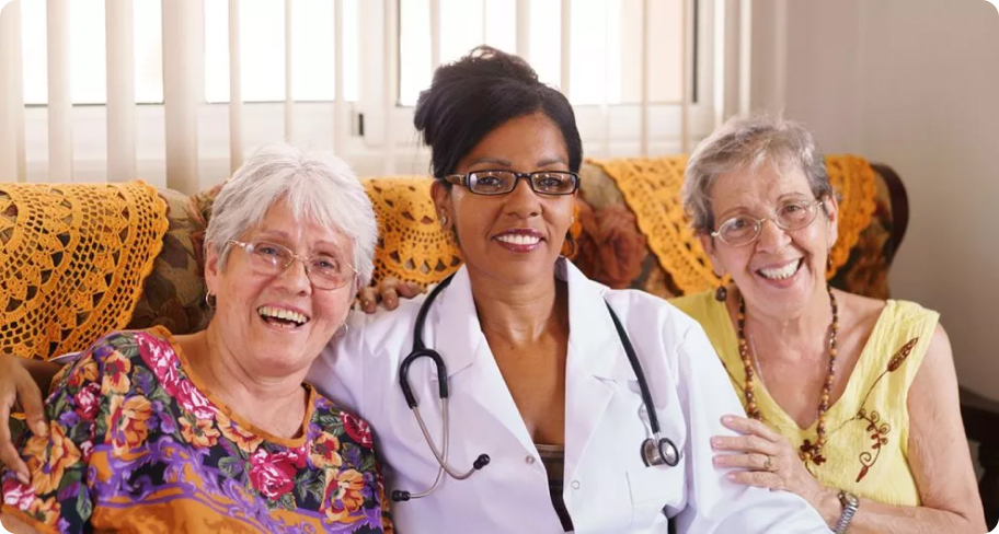 Healthcare provider standing with patient