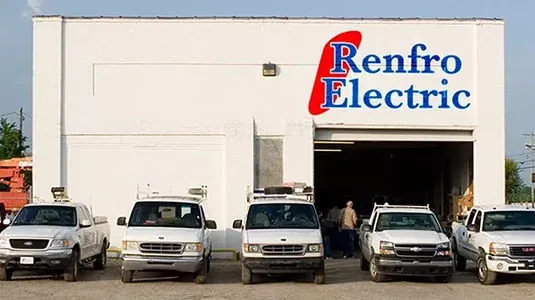Renfro Electric building with service trucks parked out front