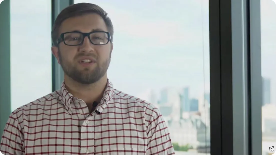 Logicforce team member speaking in an office