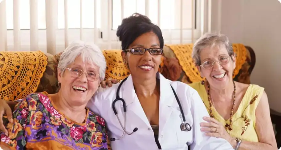 Healthcare provider standing with patient