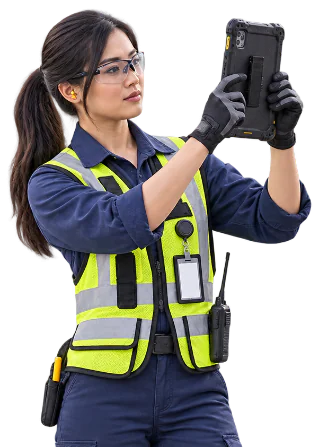 Plant technician holding a tablet
