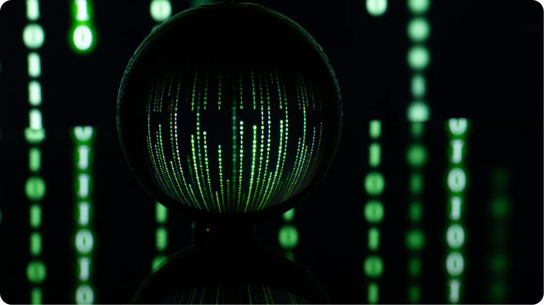 Glass sphere reflecting green digital code